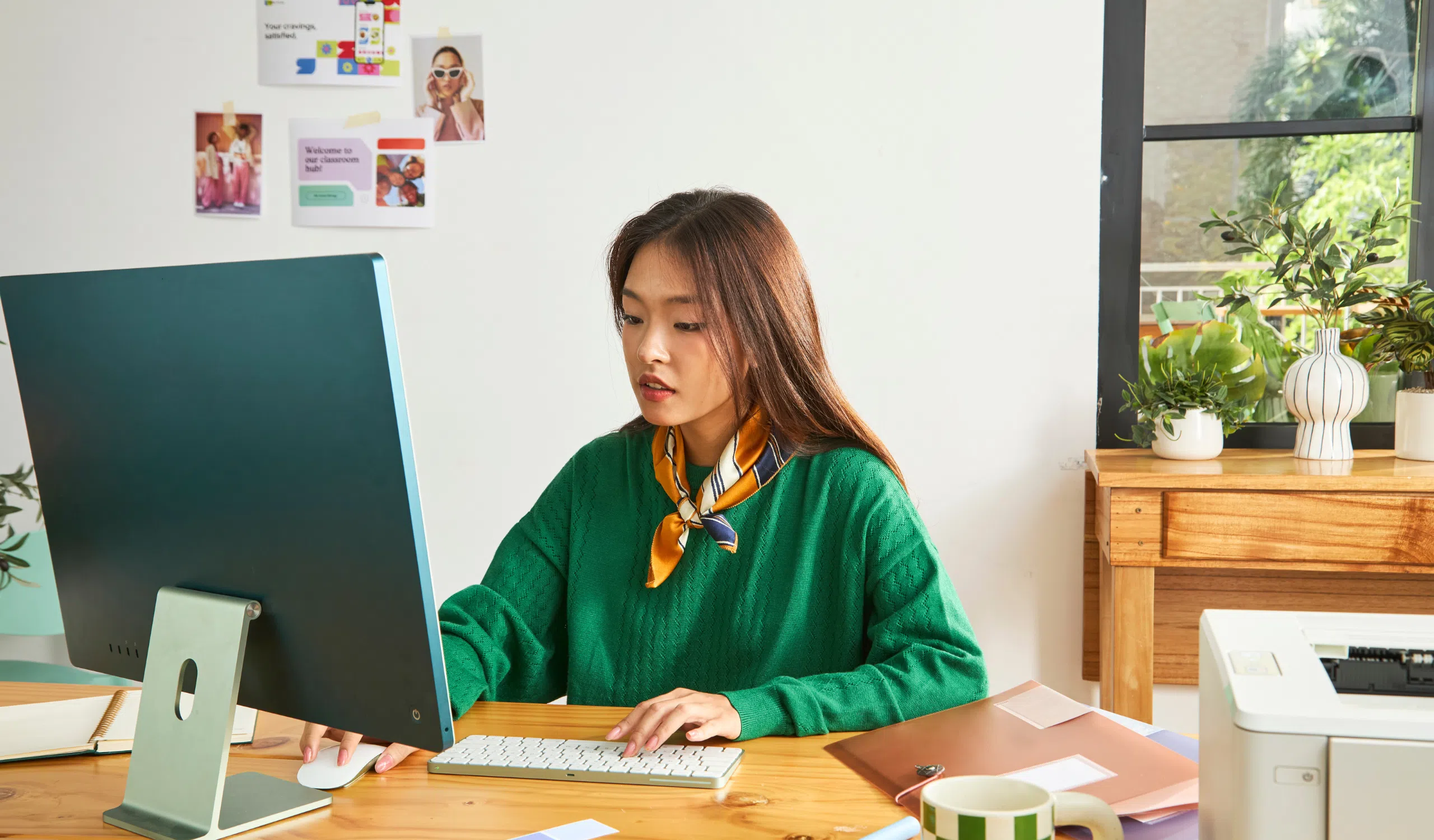 a girl at a desk learning about LLCs for Content Creators